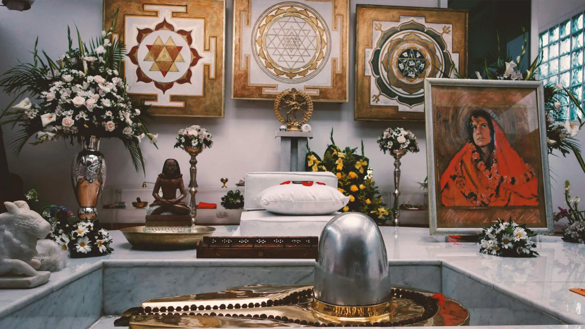 Altar with yantras and a lingam